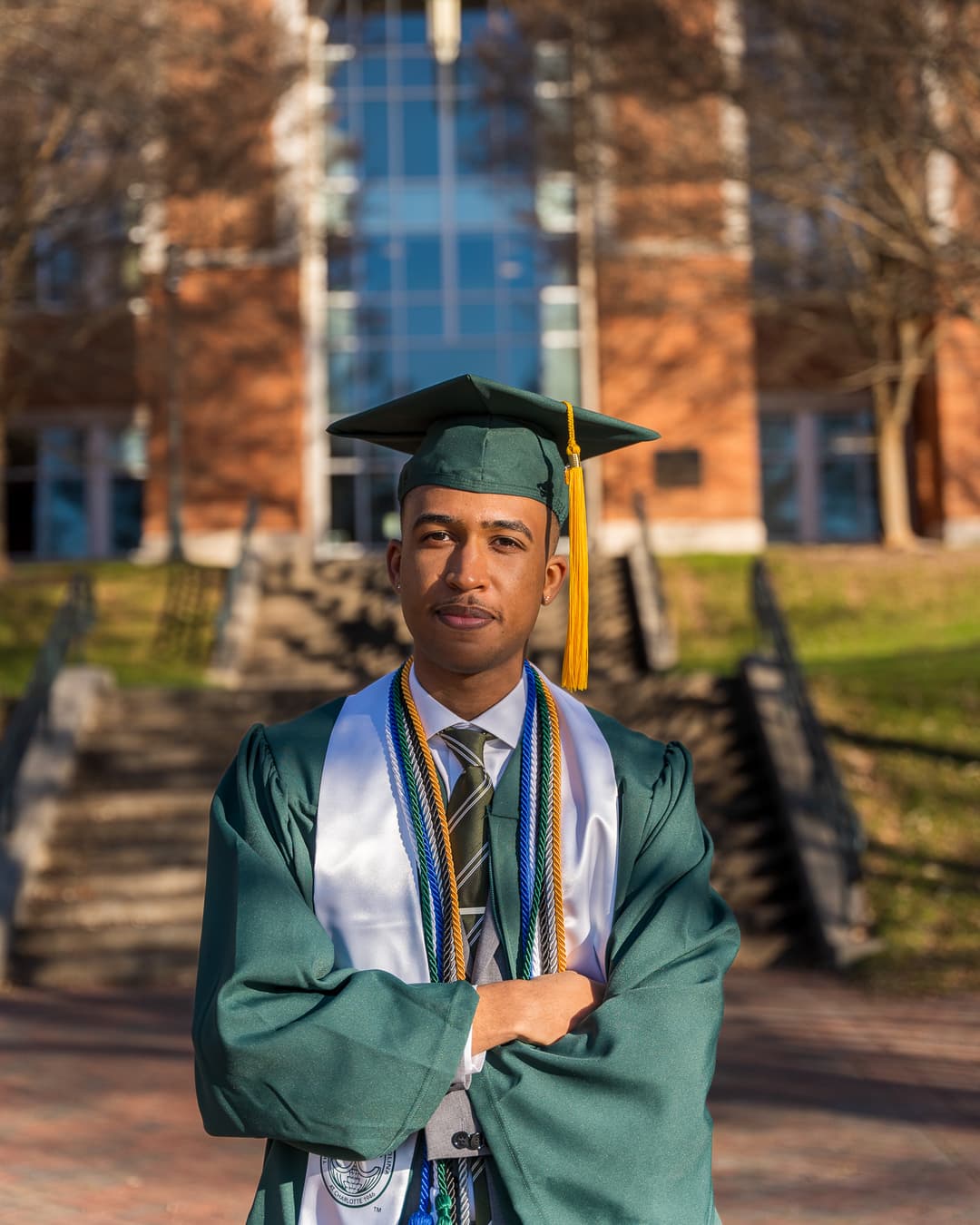 Headshot of Fausto German in graduation gown.